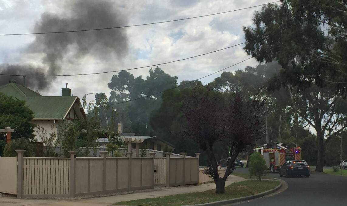 Smoke at the Havlin Street property. Picture: TOM O'CALLAGHAN
