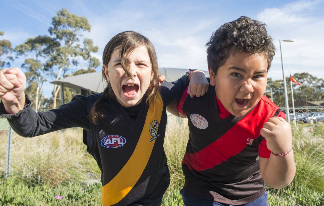 Tamra Jackson and Sam Dee get fired up before heading down to Melbourne for Dreamtime at the 'G. Picture: DARREN HOWE