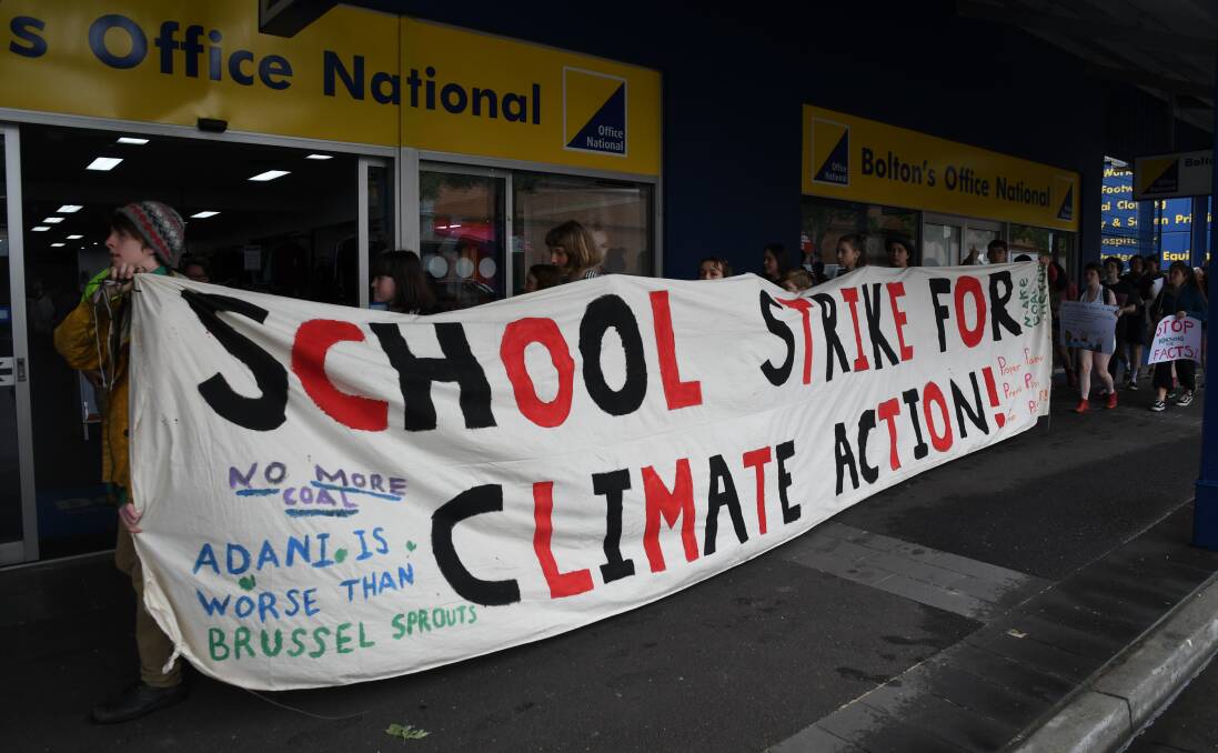 School students march through Bendigo for a second day protesting inaction on climate change. Picture: ADAM HOLMES