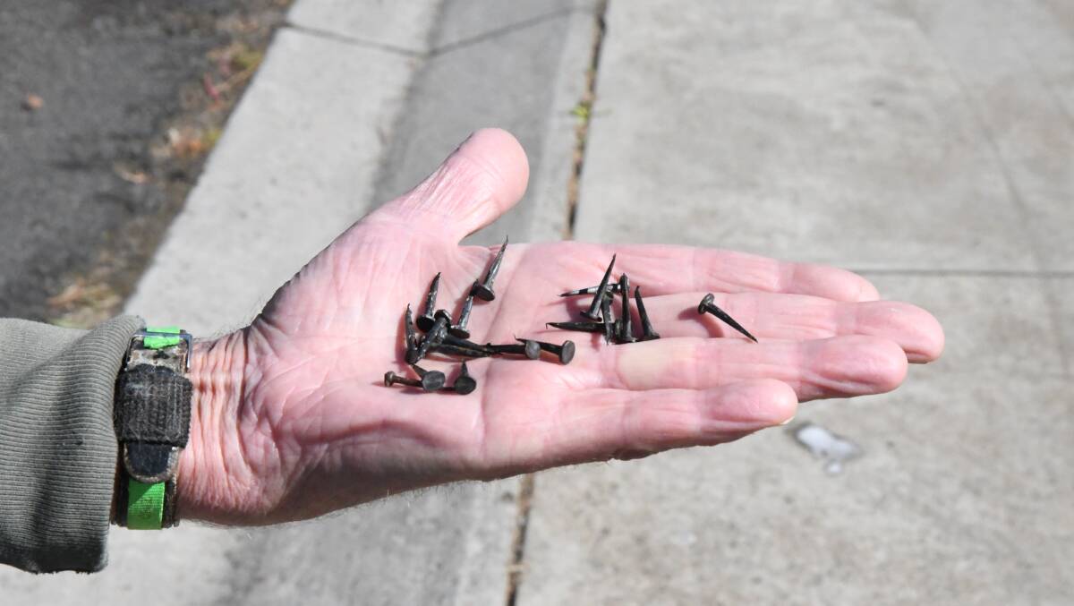 Just a small portion of the upholstery tacks found strewn across several roads in Kennington. Picture: Adam Holmes
