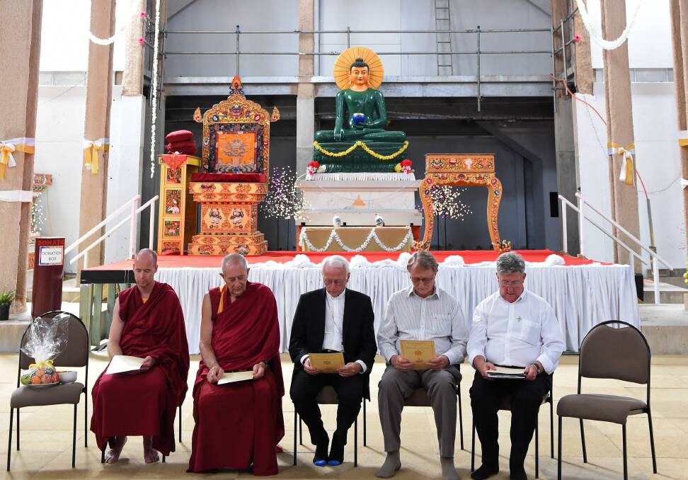 Sacred Heart Cathedral leaders pray with Buddhists at the Great Stupa of Universal Compassion earlier this year. All religious groups welcome the construction of a mosque in Bendigo.