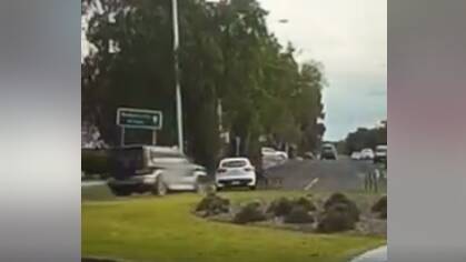 The car veered across a lane of traffic at the roundabout before hitting Blair Hinton on his bike.