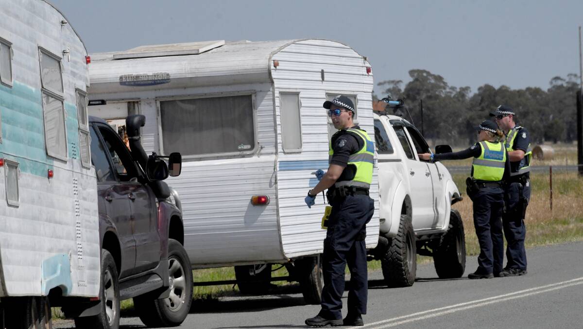Police breathalyse and drug test motorists on their way out of Earthcore in Elmore last month. Picture: DARREN HOWE