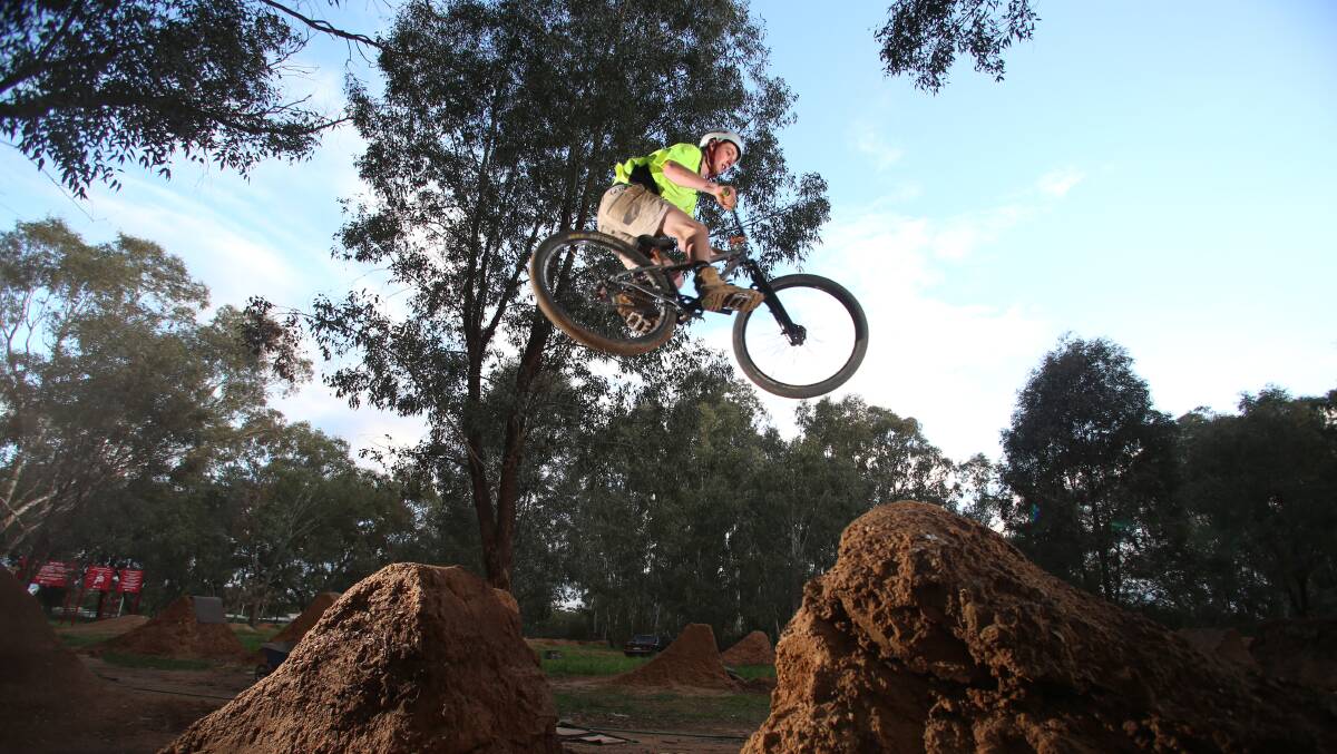 Josh Boykett jumps the trails in Strathfieldsaye this week - a far cry from their deteriorating state of the past. Picture: GLENN DANIELS