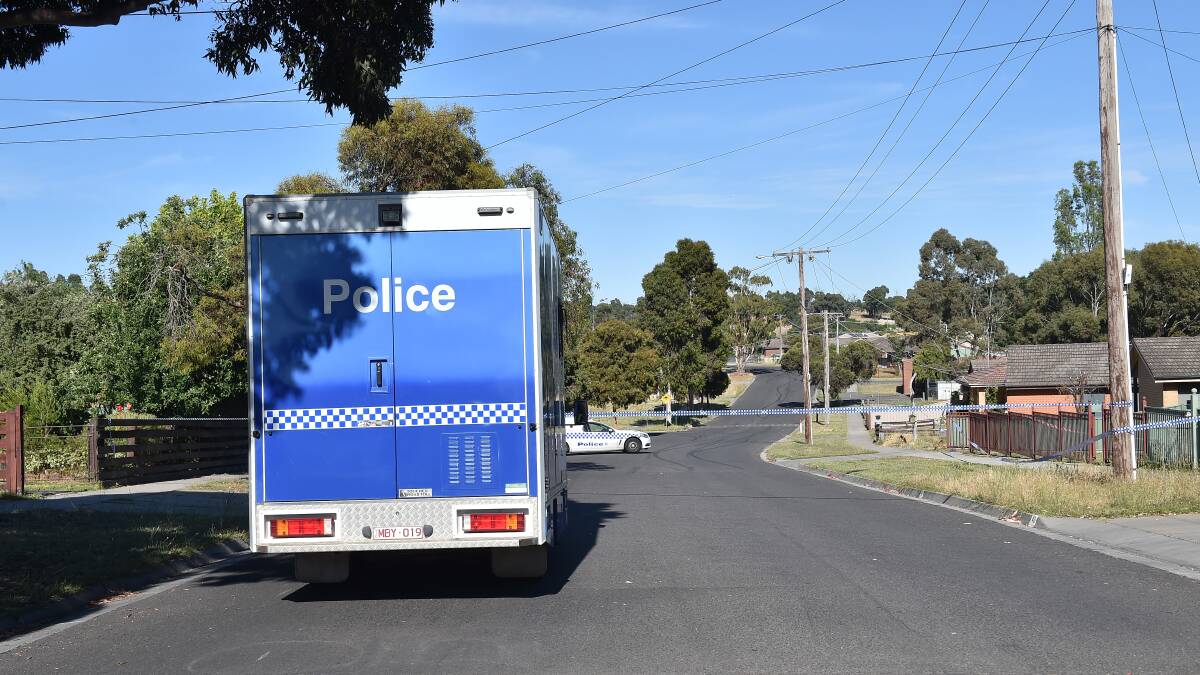 Police on the scene in Derwent Drive, Long Gully, on December 19. Picture: NONI HYETT
