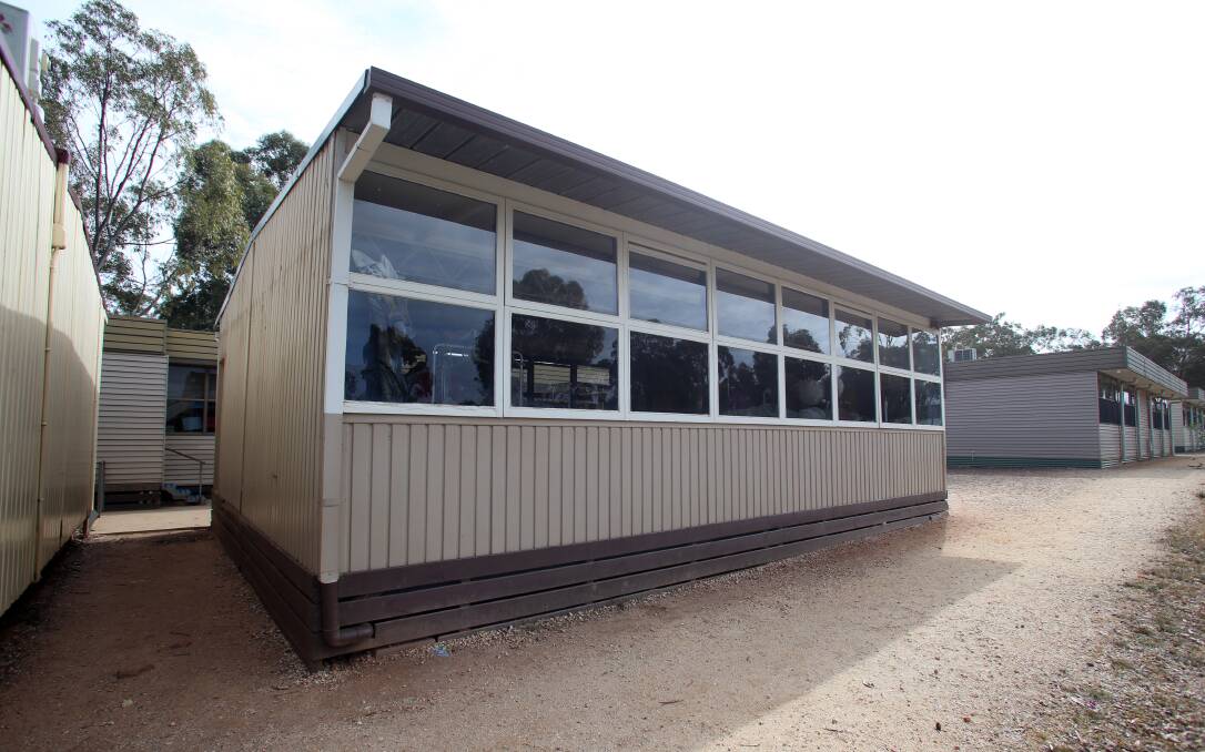 Portable classrooms are lined up across the Maiden Gully Primary School grounds, with a new one added almost every year.