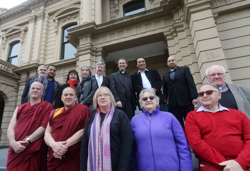 Bendigo religious leaders join together in front of town hall on Friday morning to show all faiths are welcome in the city.
