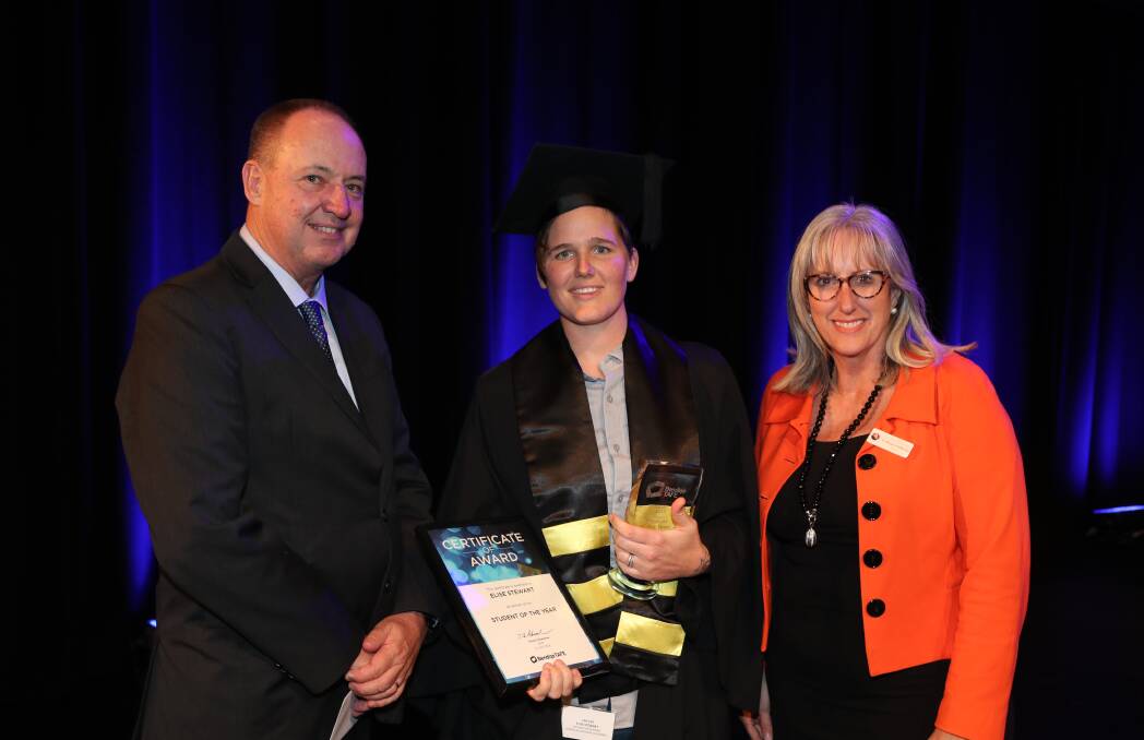 Bendigo TAFE chief executive officer Trevor Schwenke and Mayor Marg O'Rourke with Student of the Year Elise Stewart at Tuesday night's graduation ceremony at Ulumbarra Theatre.