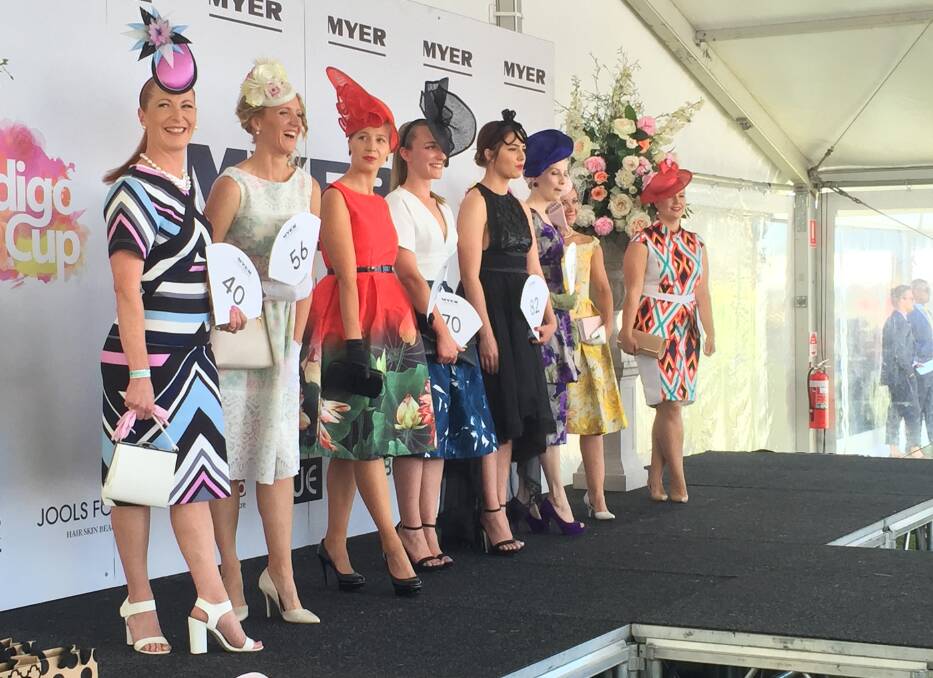 Contestants take to the stage in the millinery category.