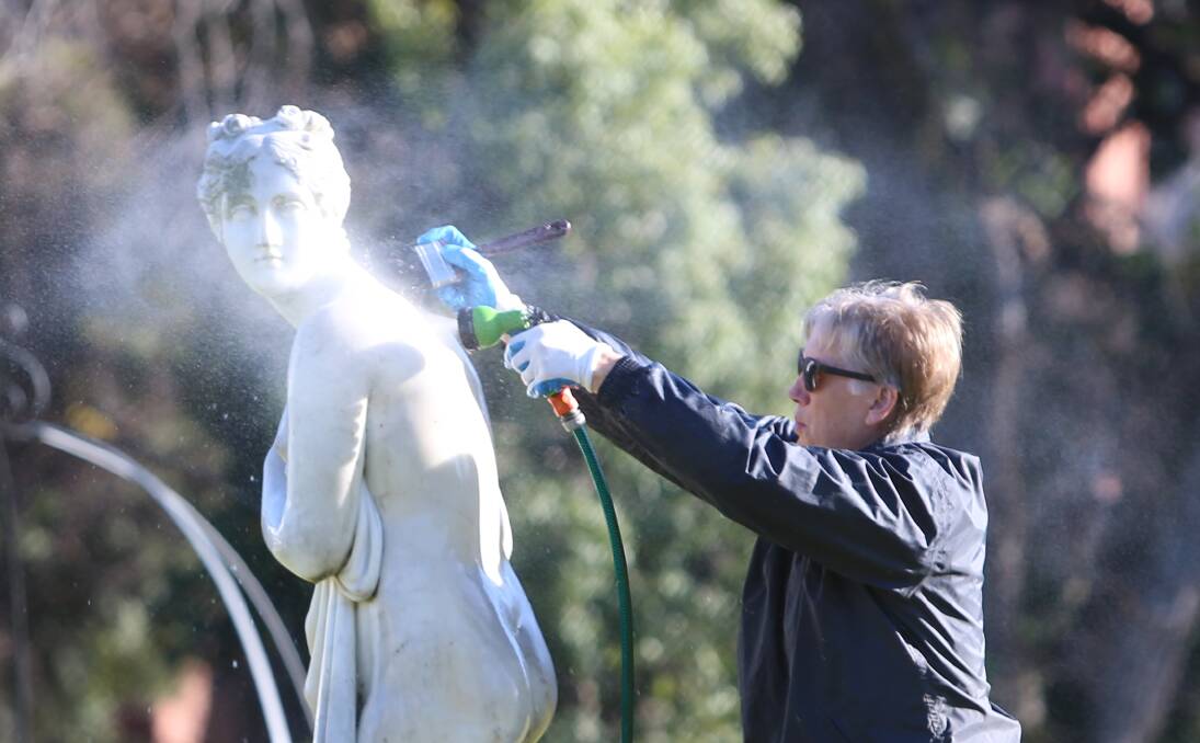 Venus struggles to hide her displeasure as she gets an outdoor shower in the middle of winter in the Bendigo Conservatory gardens. Picture: GLENN DANIELS