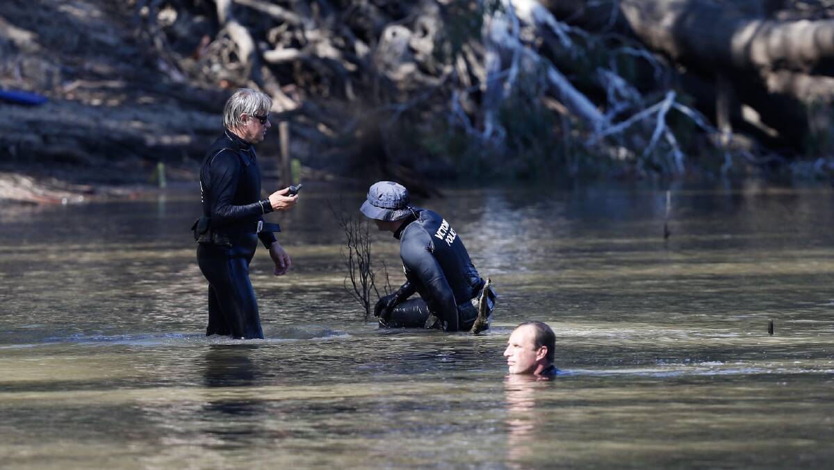 Police divers search the Murray River following the incident on March 2. Picture: Riverine Herald