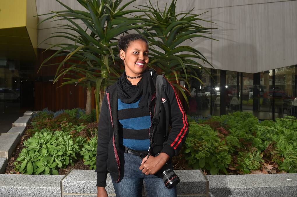 Hani Abdile traveled from Somalia to Australia as a 17-year-old refugee - a journey she has documented through poetry. She will speak in Bendigo this weekend. Picture: NONI HYETT