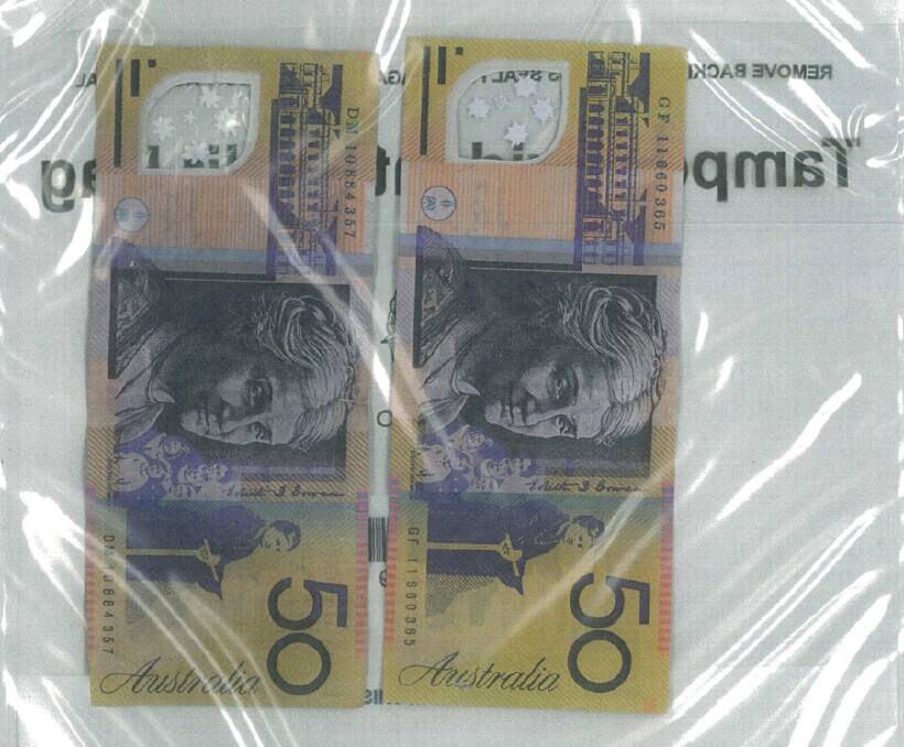 The $50 notes have a more pronounced shade of blue and the Southern Cross in the transparent window is of "poor quality".