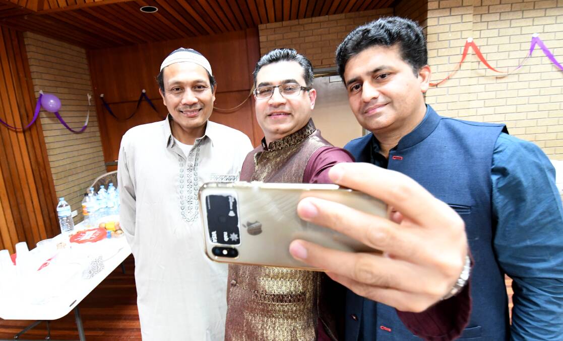 Heri Febriyanto, Fahad Jamal and Abdul Ali take a selfie. Picture: DARREN HOWE