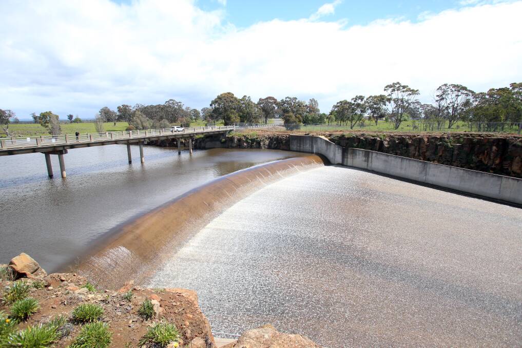 Water flows over the spillway at Lake Eppalock in early October - the first time in four years. Picture: GLENN DANIELS