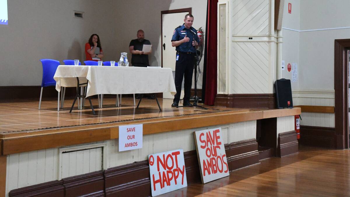 Andy Roughton, of Ambulance Victoria, takes questions from Rochester residents on Tuesday night. The town wants an end to the single-paramedic model and is pushing for a second paramedic. Picture: ADAM HOLMES