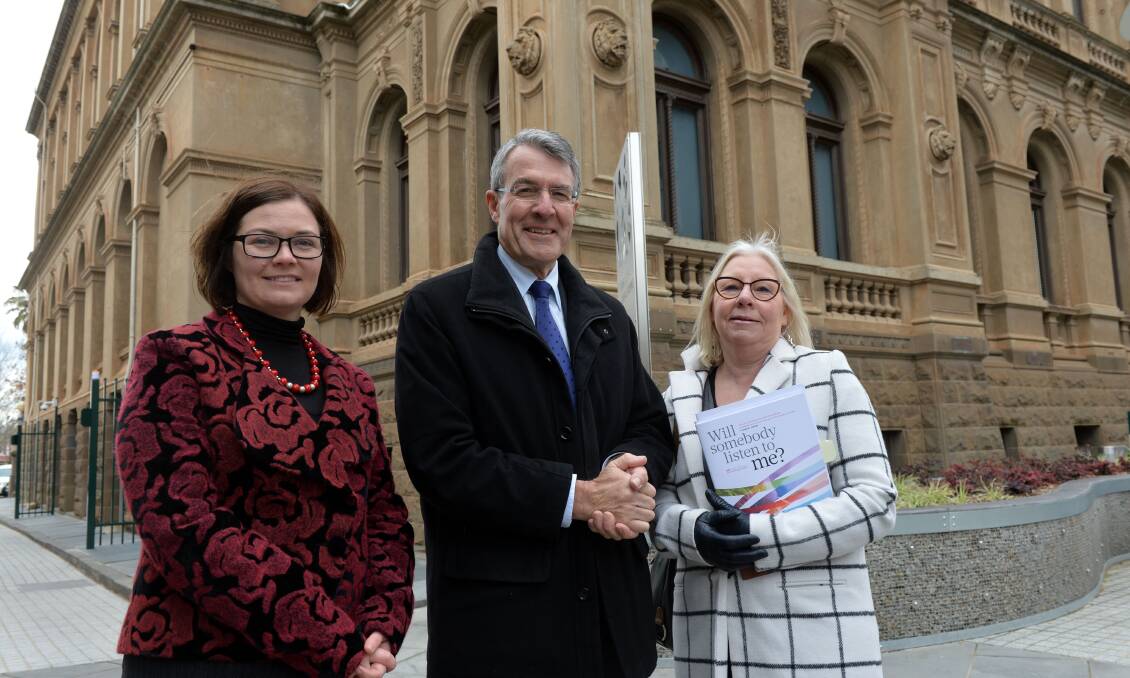 Shadow Attorney-General Mark Dreyfus (centre) with Lisa Chesters and Loddon Campaspe Community Legal Centre acting executive officer Chris Sedgman in Bendigo on Thursday. Picture: BRENDAN McCARTHY