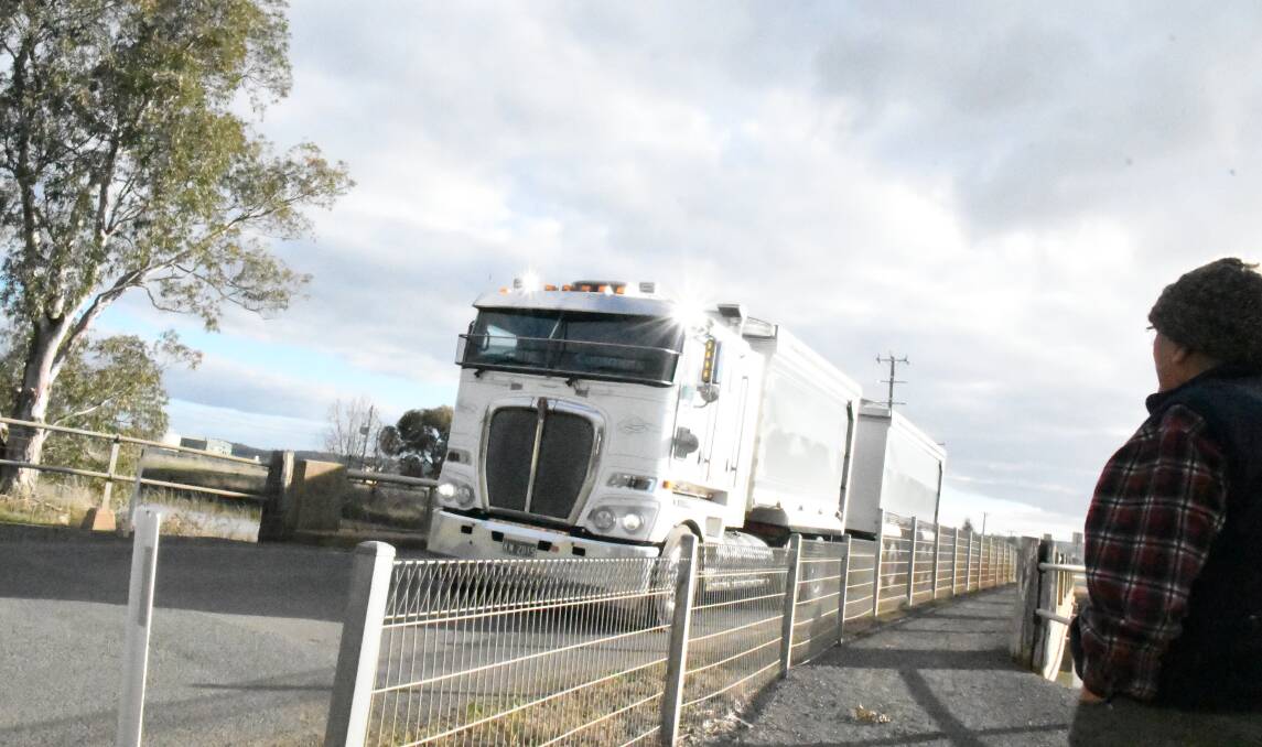 ROOM FOR TWO? John Avard watches as a truck crosses the channel bridge in Colbinabbin. He says the bridge places school children at risk. Picture: ADAM HOLMES
