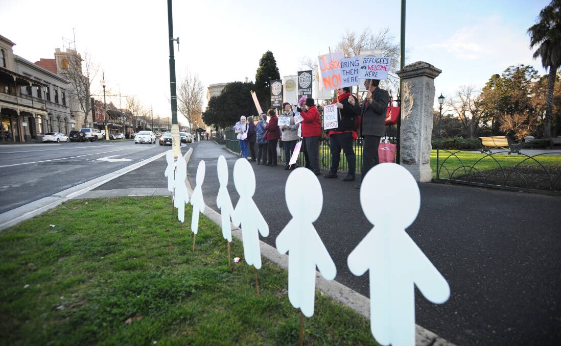 Refugee advocates rally in Bendigo earlier this year.