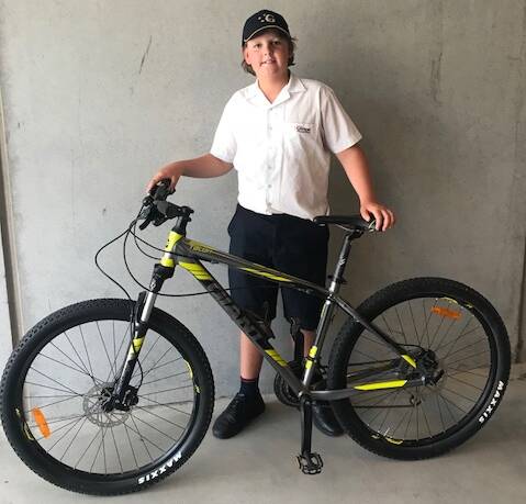 Alex Carr reunited with his mountain bike, more than two months after its theft.