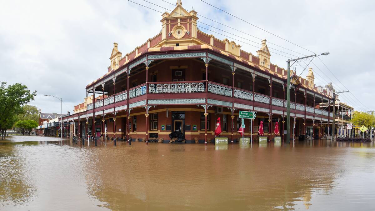 The big river dams are still full and more rain is forecast, a parliamentary inquiry was told. Picture of the a pub in Rochester by Darren Howe.