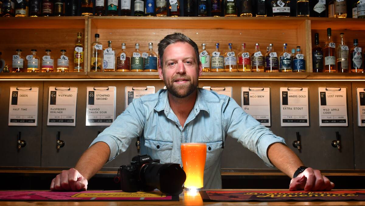 CHEERS: Robert Spencer will celebrate drinking and reviewing a beer everyday for a year. Picture: Brodie Weeding 