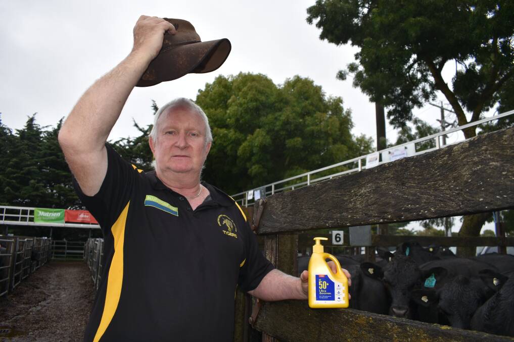 Slip! Slop! Slap! - retired Kyneton stock agent John Robson is spreading the sun safety message, after experimental treatment for skin cancer. Picture by Andrew Miller