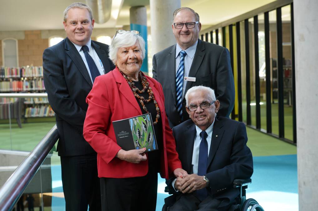 Tim Bull, Aunty Fay Carter, Barry Lyons and Uncle Kevin Coombs at the Indigenous Honour Roll launch at Bendigo Library in 2014. Picture: BRENDAN McCARTHY