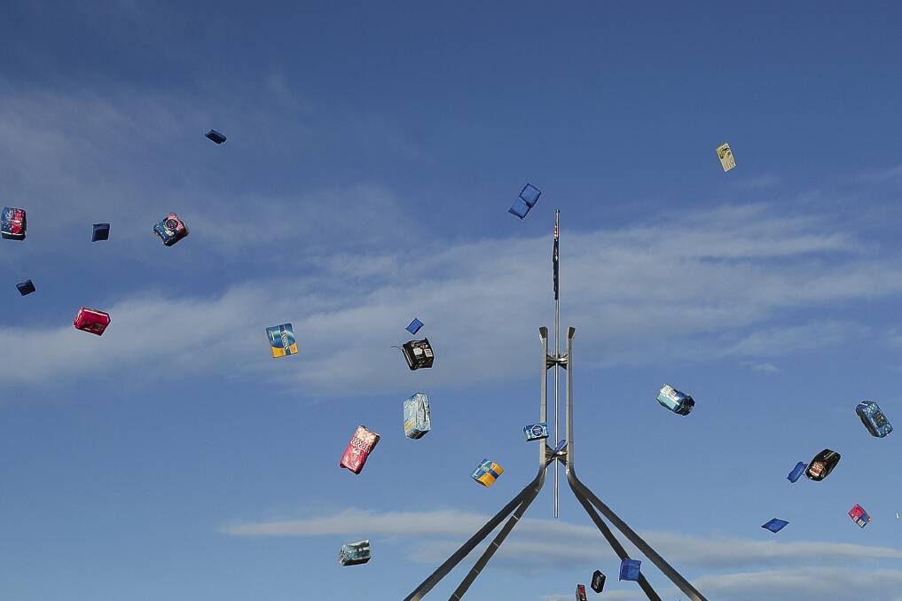 Airborne tampon packs outside Parliament House in Canberra in June. Picture: ALEX ELLINGHAUSEN
