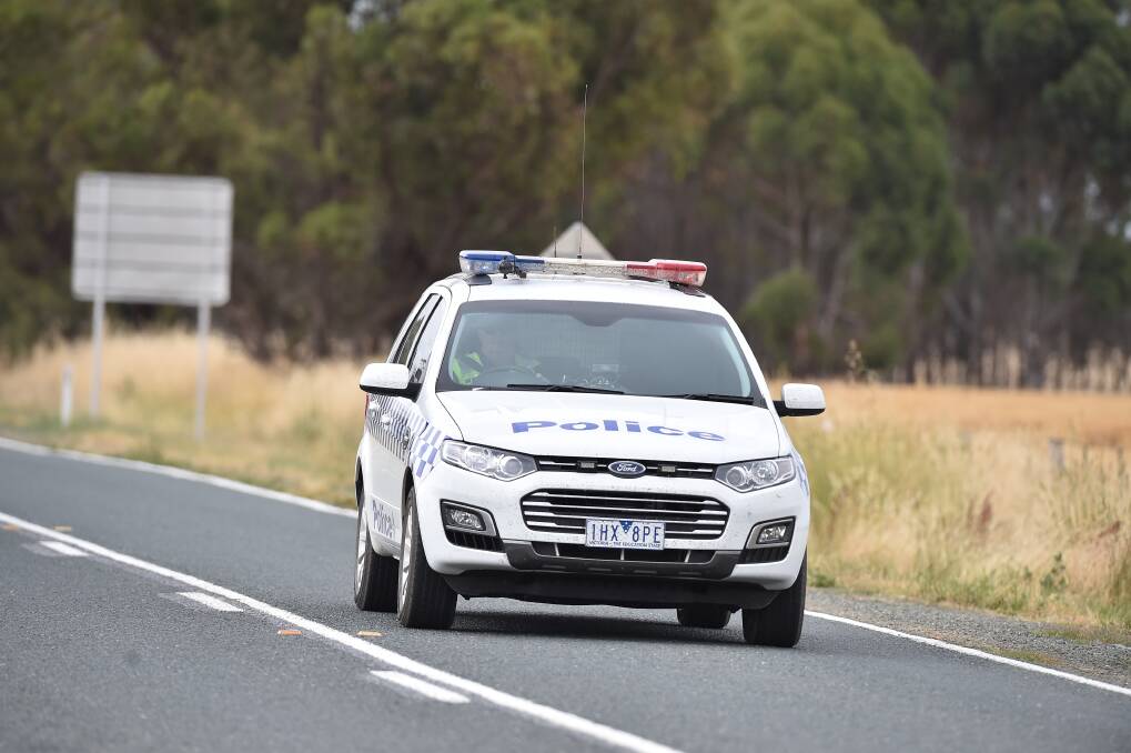 Emergency services attend the fatal crash on the Northern Highway at Runnymede. Picture: GLENN DANIELS 