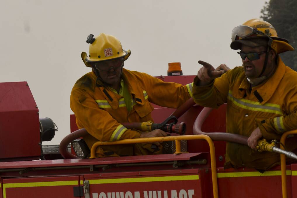 RESPONSE: Echuca Village firefighters battle a 420-hectare blaze at Strathallan, north of Rochester. Picture: NONI HYETT