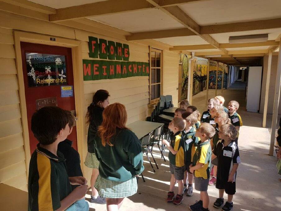 East Loddon P-12 College Year 6 German students Makayla, Brandon, Jemima, and Noah explaining the sign to a judging panel consisting of prep students. Picture: SUPPLIED