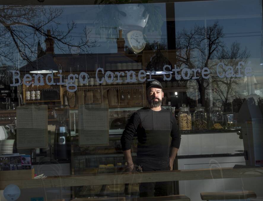 Adam Nicoletti at the Bendigo Corner Store Cafe, which had its coolroom cleaned out by unknown offenders. Picture: DARREN HOWE