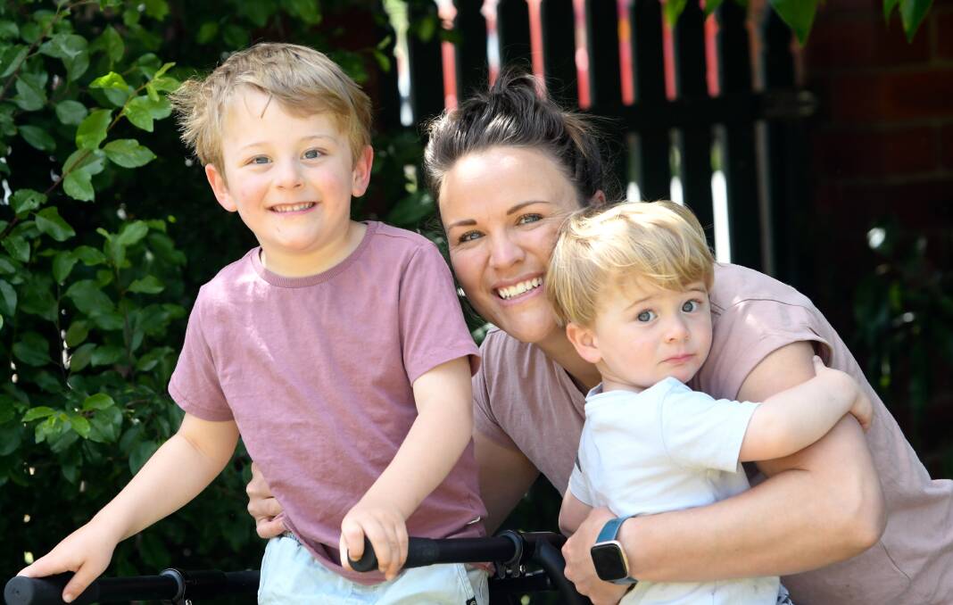Austin, Kat and Shelby Vearing. Mrs Vearing says Austin is "a funny, bubbly three-year-old who loves cars, trains, jumping in muddy puddles and the park". Picture: NONI HYETT