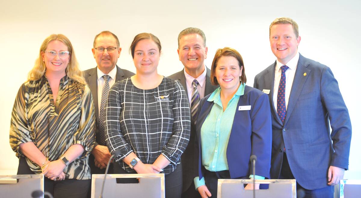 Rhianna Kerr, centre, with members of the Victorian Economy and Infrastructure Parliamentary Committee. Picture: EMMA D'AGOSTINO