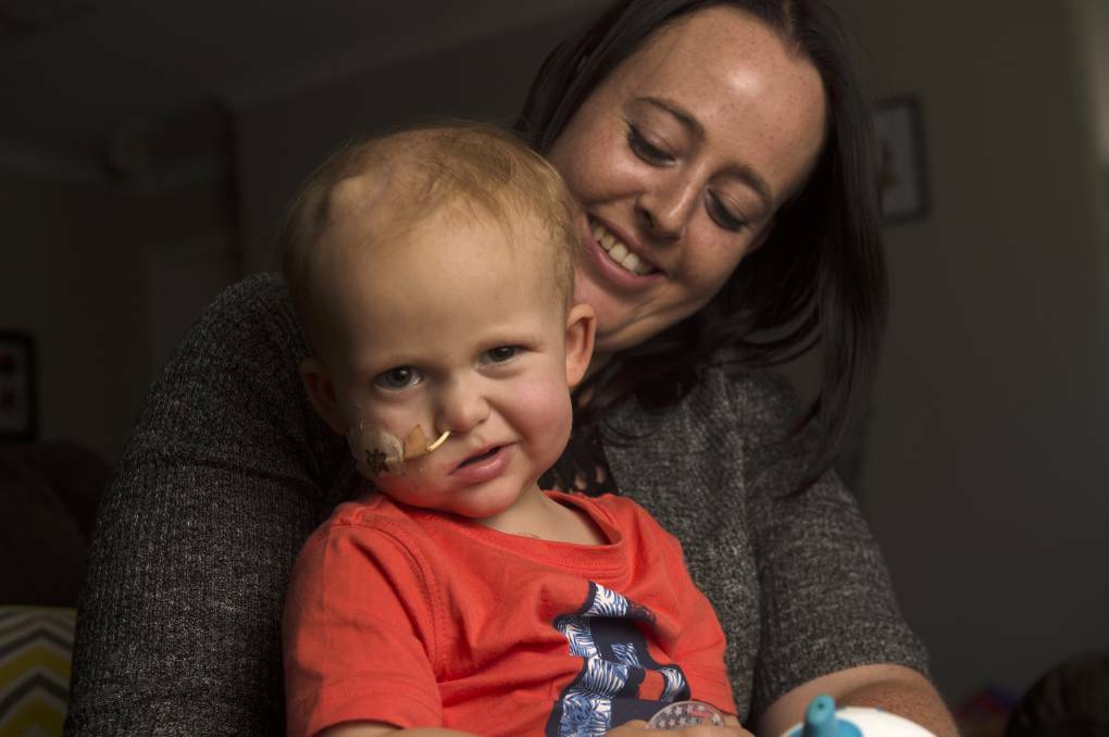 FIGHTER JETT: Jess Wilson with her son Jett Hamley, who is undergoing treatment for a rare brain cancer. Picture: DARREN HOWE