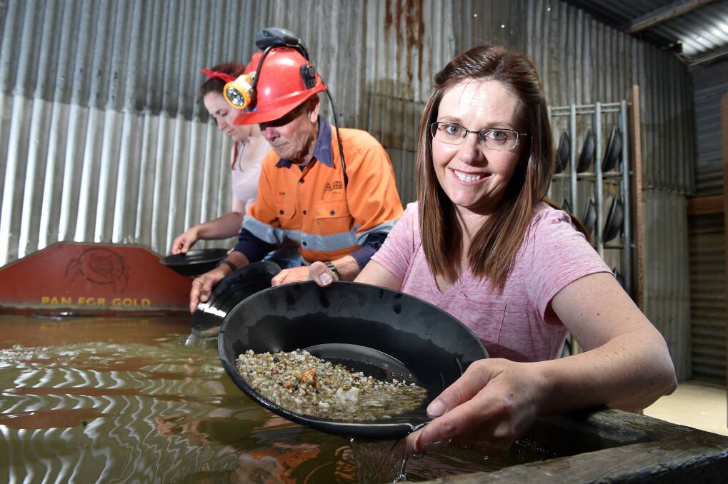 Evonne Oxenham, Ian Johnson and Zoe Boyd panning for gold in 2016. Picture: NONI HYETT
