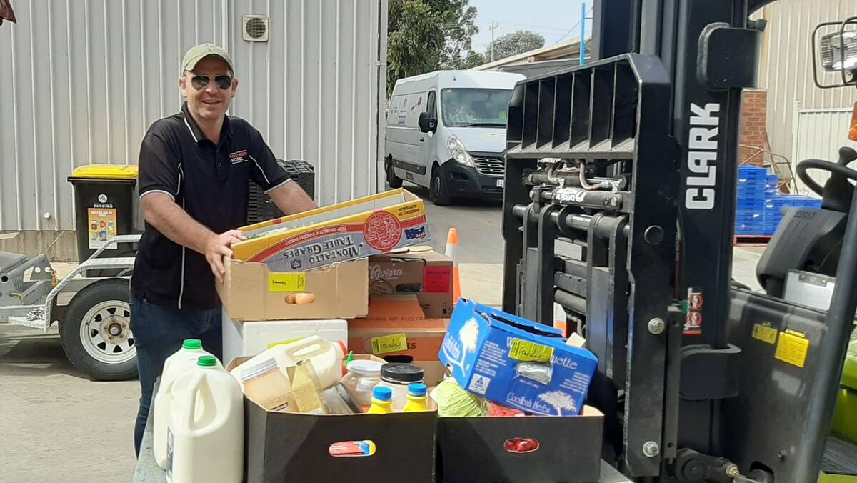 A donation from The Foundry Hotel and Mister Bobs Sports Bar. Picture: BENDIGO FOODSHARE