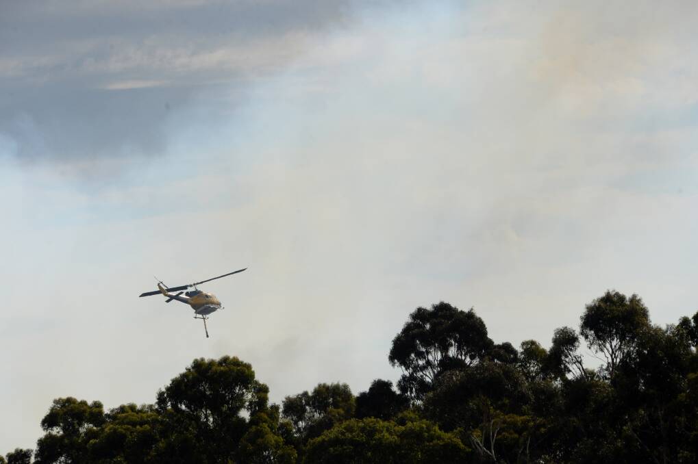 Firefighting aircraft responds to the Benloch fire. Picture: DARREN HOWE