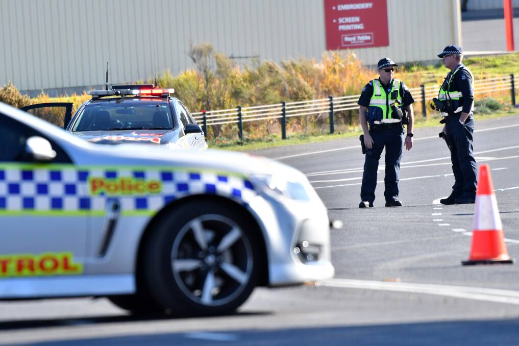 Bendigo police remained at the scene for hours after the crash. Picture: DARREN HOWE