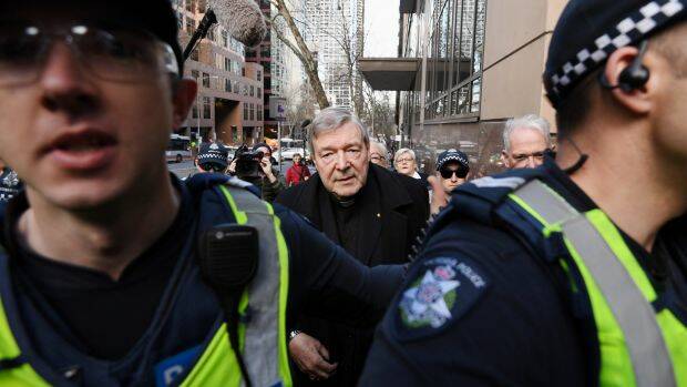 Cardinal George Pell makes the trip from his lawyers' offices to Melbourne Magistrates Court. Photo Justin McManus