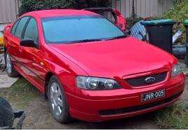 Police have released an image of the red BA Ford Falcon. Picture: EYEWATCH - BENDIGO POLICE SERVICE AREA