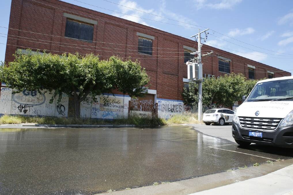 The leak at the old Gillies Pie Factory flowed onto Garsed Street for some time. Picture: EMMA D'AGOSTINO