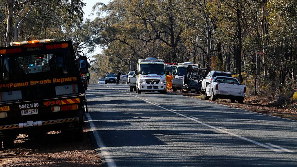 Emergency services respond to a two-car crash on Sandy Creek-Barnadown Road near Old Stock Route Road. Picture: EMMA D'AGOSTINO