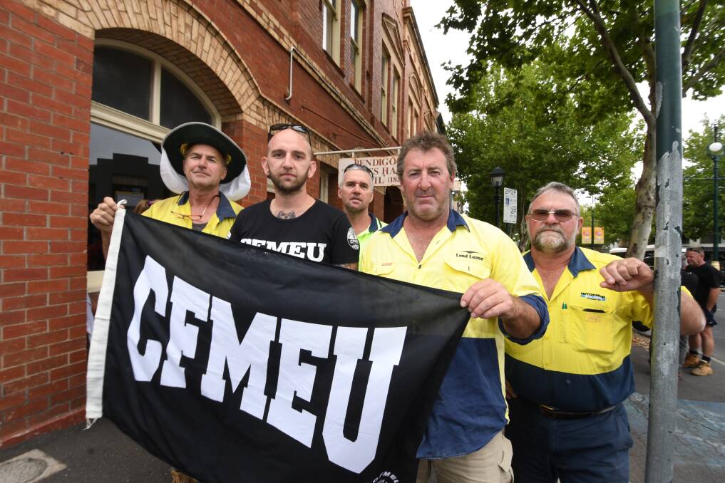 James Simpson leads a group of CFMEU members. Picture: NONI HYETT
