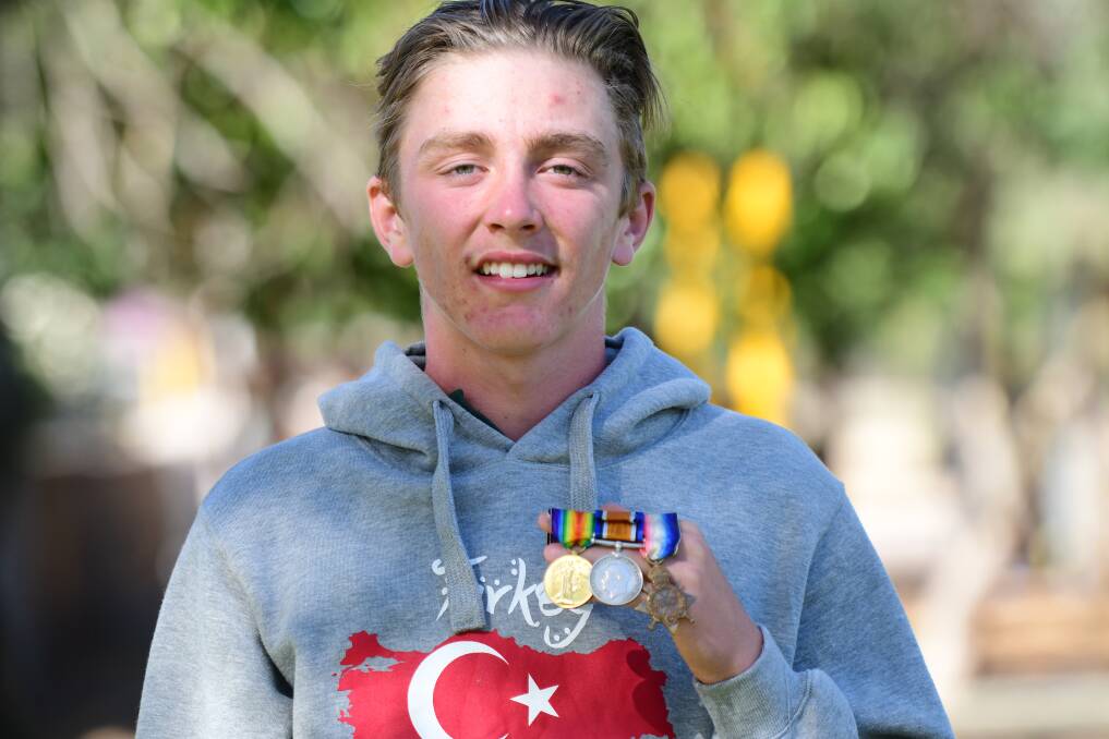 Will Stringer with Private George Stringer's medals. Picture: NONI HYETT
