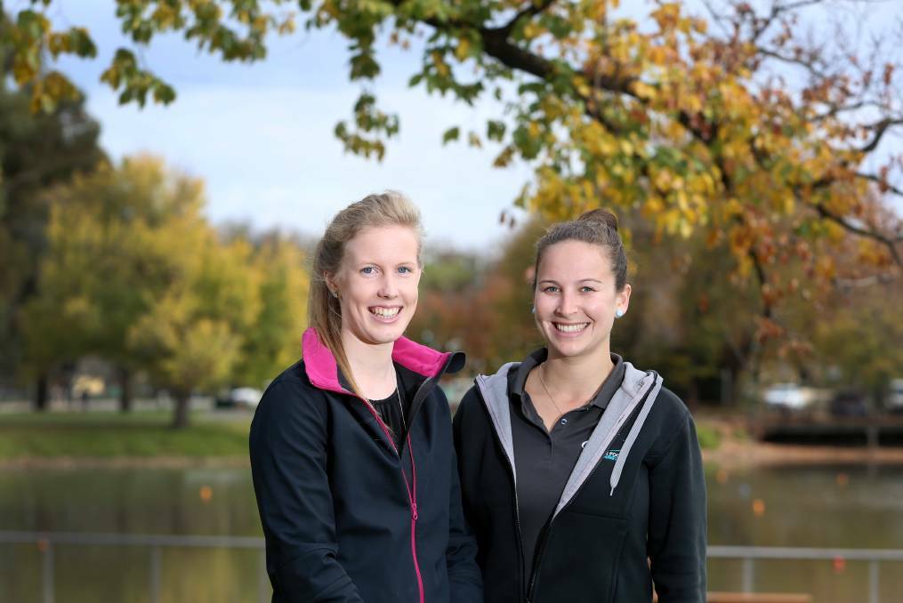 ME-TIME: Sports Focus project co-ordinators Stacey Keller and Natalie Lake warm up for a series of free activities for women. Picture: GLENN DANIELS