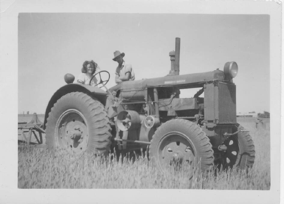 June Solly and her husband Edwin on their tractor in the 1950s. Picture: SUPPLIED