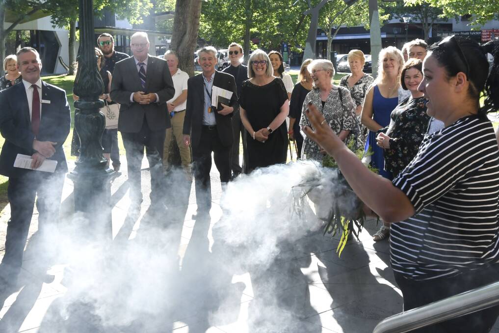 A smoking ceremony starts the City of Greater Bendigo's special meeting to elect a mayor and deputy. Picture: NONI HYETT