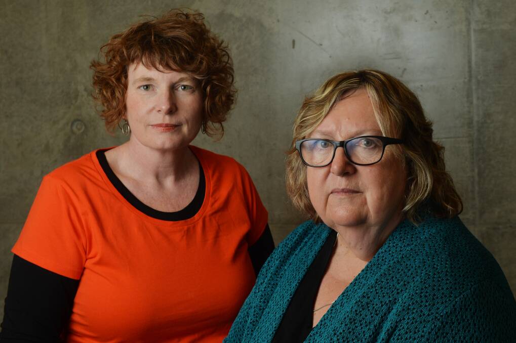 The Centre for Non-Violence's Robyn Trainor and Annie North's Julie Oberin. Picture: DARREN HOWE
